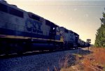 CSX 2687 leads its train past a waiting train